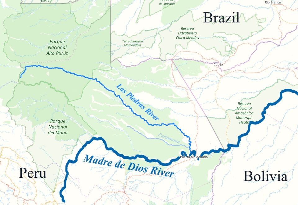 Map of the border between Peru, Brazil and Bolivia with the Las Piedras River and its tributary the Pariamanu highlighted in blue, running from northwest to southeast to Puerto Maldonado, between Alto Purús and Manu national parks